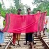 Bangladeshi youth waves flag to stop train, saves 300 lives