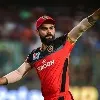 Virat Kohli drinking black water