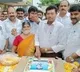 Minister Appalaraju cuts the cake during the launch of Sridevi Soda Center