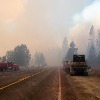 Largest wildfire in US nearly half contained