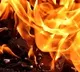 Chit fund company Agent set fire to a cell phone shop owner