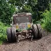 Nadendla shares some photos of a bus which lost its back tyres on a ugly road
