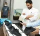 Jagan examines the quality of Jagananna kit bag and boots