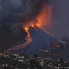 Lava engulfs 100 homes in La Palma after volcano erupts