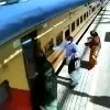 Passengers saved a woman from falling under a moving train at Vasai Road Railway Station