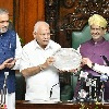 Lok Sabha Speaker Om Birla honours Yediyurappa with best legislator award