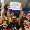 IPL Fan Shows A poster That His wife not letting him to wear CSK Jersey