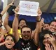 IPL Fan Shows A poster That His wife not letting him to wear CSK Jersey