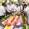 CM Jagan pays floral tribute to his father in law