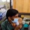 Ahmedabad Officials announce mobile phone and oil packets for vaccination