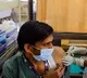 Ahmedabad Officials announce mobile phone and oil packets for vaccination