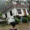 House in Kerala collapsed into a river after heavy rains lashed