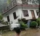 House in Kerala collapsed into a river after heavy rains lashed
