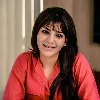 Samantha plays tug of war with friends