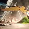 municipal officials remove shops in Dharmavarm market