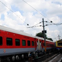 Train runs back to save woman, newborn