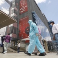 Australians welcomed home in 1st step of border reopening amid Covid-19 pandemic