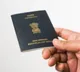 Kerala man gets a real passport along with passport cover