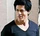 Sharukh reportedly hide his face with an umbrella spotted at airport