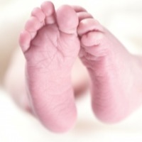 Woman gives birth in train toilet