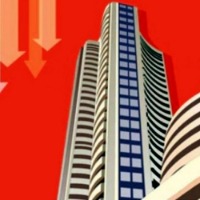 Global cues subdue equity markets; Sensex down over 400 pts