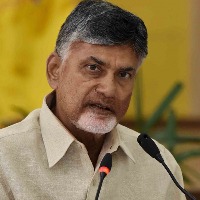 TDP legislators walk to Andhra Assembly to demand cut in fuel tax