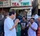 Vice President of India Venkaiah Naidu appreciates a tea shop owner in Vizag