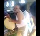 Chevireddy unloads bags of essentials from a navy chopper