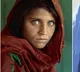 Green eyed woman from Aghanistan goes to Italy