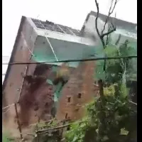 Heavy rains lashes Kadapa district as a house collapse into river