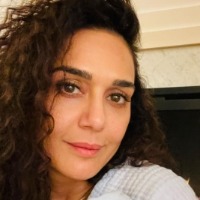 Preity Zinta is loving 'burp cloths, diapers and babies'