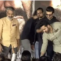 Ram Charan pinched Jr NTR