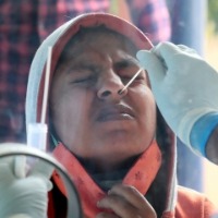 India reports 7,447 new Covid cases, 391 deaths