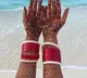 Katrina shares glimpse of beachy honeymoon, shows mehendi adorned hands