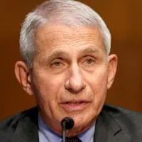 avoid unnecessary travel warns anthony fauci