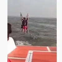 Two women falls into sea while parasailing