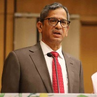 CJI takes bullock cart ride duirng a visit to native village