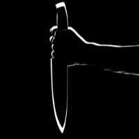 Man surrenders after stabbing wife in public view