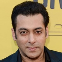 Salman Khan drives an auto-rickshaw on a busy street