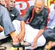 CPI Narayana polish Chappals against govt decision on GST on Chappals