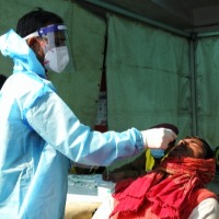 India reports 58,097 fresh Covid cases, Omicron tally reaches 2,135