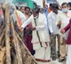 Somu Veerraju protests against govt by bon fire