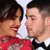 Priyanka, Nick Jonas bring home a child
