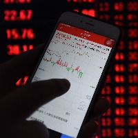 Asian markets tumble to 15 month lows, Fed expected to raise interest rates 6 times this year