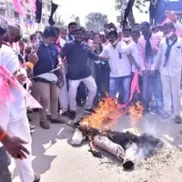 TRS cadre burns PM Modi effigies everey where in Telangana