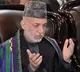 Afghan girls 'must definitely' return to school: Karzai