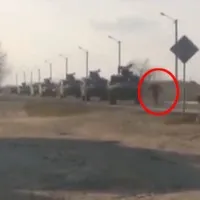 Ukrainian man tries to stop Russian military convoy as it nears Kyiv