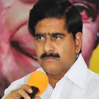 devineni slams ycp