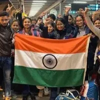 Students in Ukraine use three colour sprays to make indian flg
