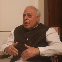 Road show in Varanasi no show in Pisochyn: Sibal
